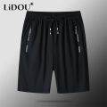 2023 Summer New Solid Color Loose Casual Thin Style Knee Length Pants Man Elastic Waist Pockets Zipper Street Motion Shorts. 