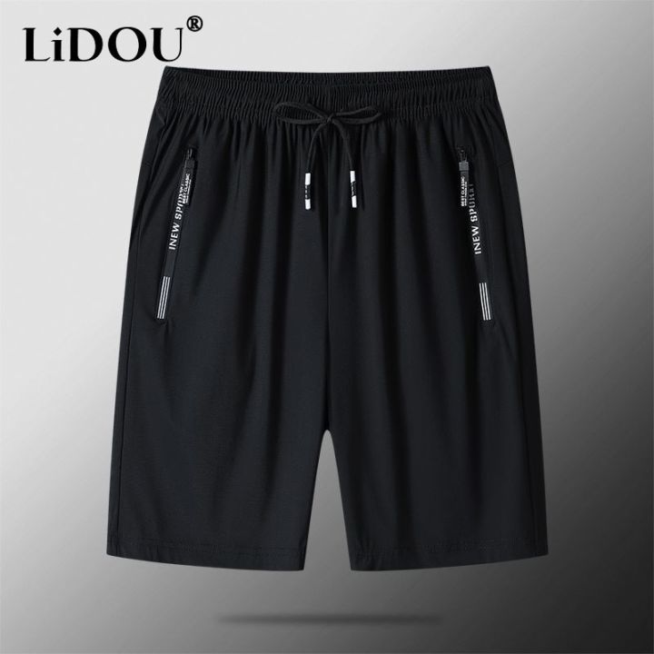 2023 Summer New Solid Color Loose Casual Thin Style Knee Length Pants Man Elastic Waist Pockets Zipper Street Motion Shorts