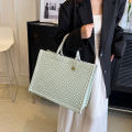 Bag women's sense canvas commuter bag 2024 spring new tote bag original design large capacity handbag foreign temperament.