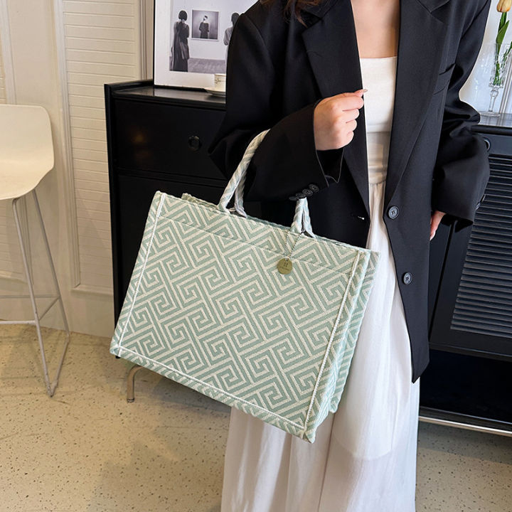 Bag%20women's%20sense%20canvas%20commuter%20bag%202024%20spring%20new%20tote%20bag%20original%20design%20large%20capacity%20handbag%20foreign%20temperament%20-%20Image%203