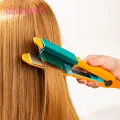 A comb makes straightening hair a breeze because it allows for more control over the hair while using the styling tool. The comb glides over the hair to smooth it out.. 