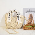 Alphabet silk scarf handpiece straw bag versatile semicircle weave women's bag women's seaside row vacation photo cross-body beach bag.