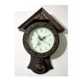 Classic pendulum wall clock. 