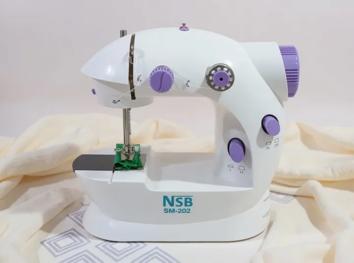 Mini%20Sewing%20Machine%20for%20Beginners,%20Dual%20Speed%20Easy%20Automatic%20Sewing%20Machine%20with%20Expansion%20Table%20and%20Sewing%20Tool,%20Suitable%20for%20Family%20and%20Travel%20-%20Image%203