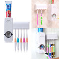 Automatic Toothpaste Dispenser And Brush Holder Set.