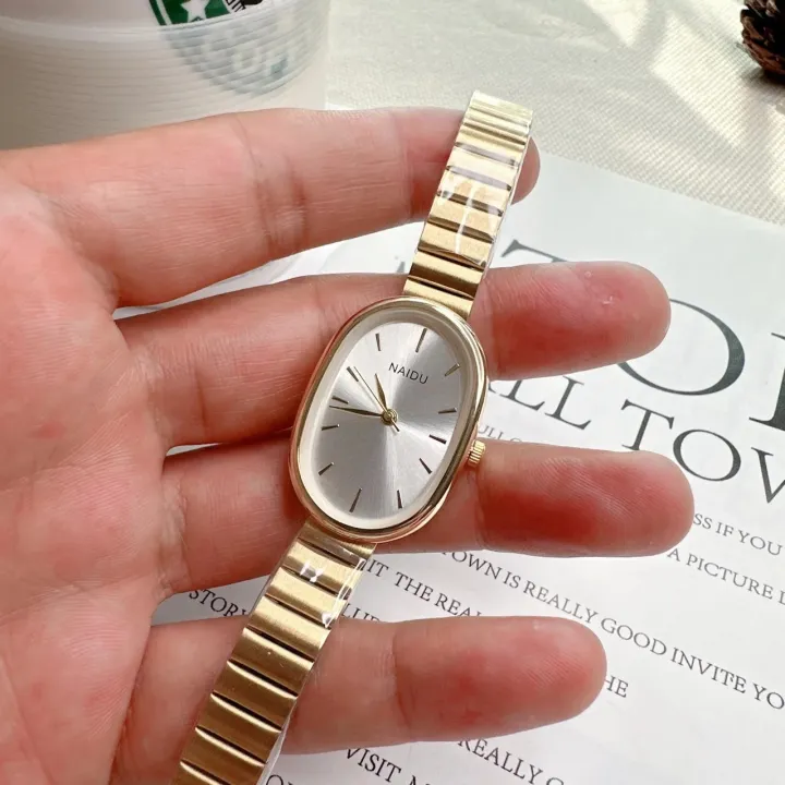 Women%20Quartz%20Watch%20Luxury%20Oval%20Shaped%20Fashion%20Mini%20Case%20Small%20Roman%20Numeral%20Dial%20Female%20Full%20Metal%20Band%20Watches%20Niche%20Wristwatch%20-%20Image%202