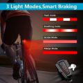 Camluxy Waterproof Smart Auto Brake Sensing Light Wireless Bike Burglar Alarm USB Charge Remote Control Bicycle Anti Theft Lamp. 