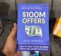 $100M Offers: How To Make Offers So Good People Feel Stupid Saying No by Alex Hormozi - Premium - Paperback.