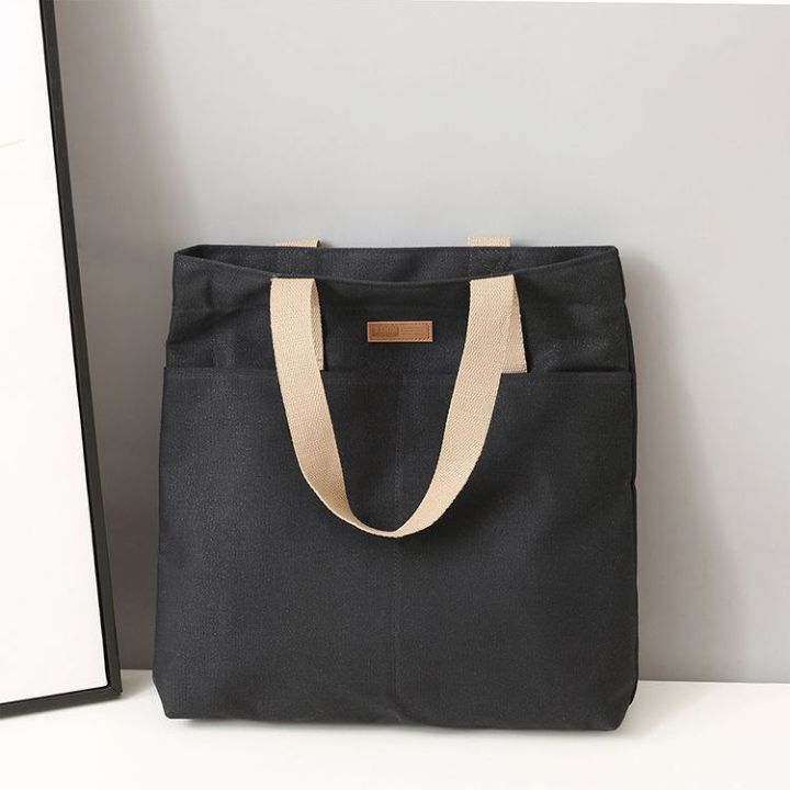 TAG%20Lifestyle%20Canvas%20Tote%20Bag/Fashionable%20Top%20Handle%20Olive%20Green%20Color%20With%202%20Big%20Outside%20Pocket%20and%20Zipper%20Enclosure%20for%20girls%20For%20University/College/Trendy%20Fashionable%20Women%20-%20Image%206