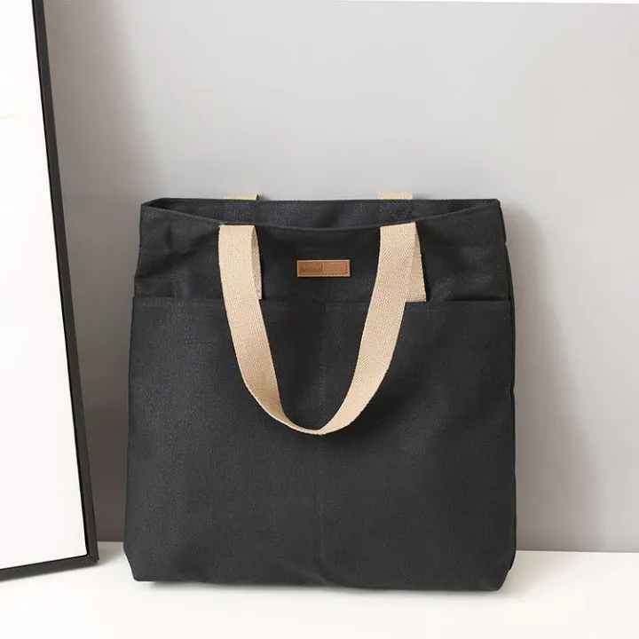 TAG%20Lifestyle%20Canvas%20Tote%20Bag/Fashionable%20Top%20Handle%20Olive%20Green%20Color%20With%202%20Big%20Outside%20Pocket%20and%20Zipper%20Enclosure%20for%20girls%20For%20University/College/Trendy%20Fashionable%20Women%20-%20Image%206