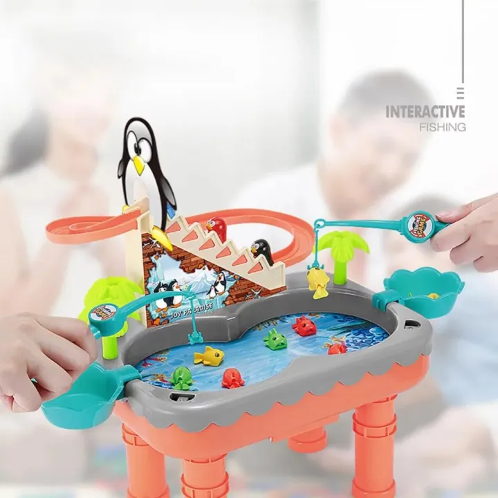 Tido%20Toys%20Fishing%20Game%20for%20Kids%20-%20An%20Interactive%20Party%20Toy%20with%20Electronic%20Slide%20Magnetic%20Pond,%203%20Magnetic%20Penguin,%209%20Fish,%202%20Fishing%20Poles%20-%20Image%204