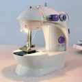 MINI SEWING MACHINE. 