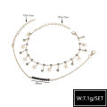 Cross-border hot selling foot ornaments European and American simple black crystal beads rhinestone bow 2-piece set double beach anklet women.