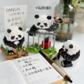 Compatible with LEGO National Treasure Panda Huahua Guo Lai Menglan model ornaments children's puzzle building block toys gifts. 