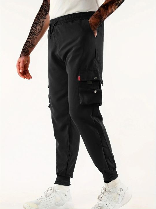 Workwear%20pants%20for%20men's%20spring%20and%20autumn%20styles%20with%20multiple%20pockets%20and%20ankle%20straps,%20casual%20and%20versatile%20cropped%20pants%20-%20Image%202