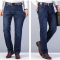 2022 Fitted Straight Stretch Denim Jeans Classic Style Badge Youth Men's Business Casual Jeans Trousers.