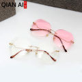 Qianai new fashion hipster cut edge sunglasses women's irregular fashion rimless ocean piece sunglasses driving mirrors.