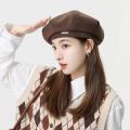 Black beret new women's autumn and winter Japanese face show small woolen octagonal hat ins painter hat big head hat.