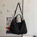 Japanese and Korean large-capacity washed canvas bag women's simple casual literary tote bag shoulder bag student class crossbody bag.