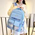 New children's school bag for primary school students 3-6 grade checkered color-blocking, ultra-lightweight burden reduction spine protection backpack for foreign trade. 