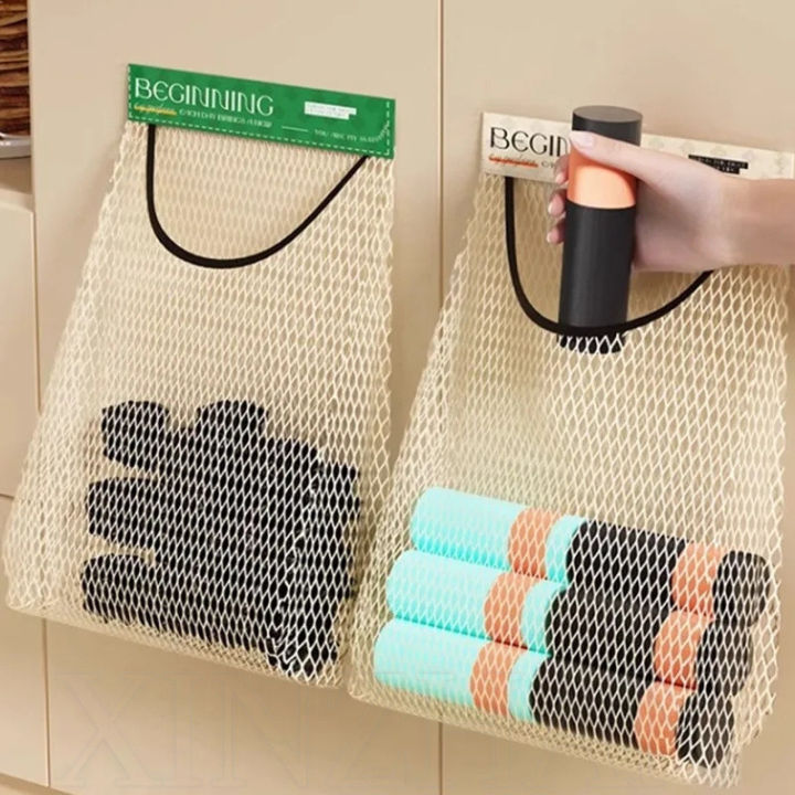 Elastic%20Mesh%20Storage%20Bag%20-%20For%20Kitchen%20Storage%20Fruits,%20Vegetables,%20Trash%20bag,%20Miscellaneous%20-%20Reusable%20,Free%20Wall%20Mounted,%20Self-Adhesive%20-%20Hanging%20Storage%20Mesh%20Bags%20-%20Image%202