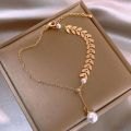 Trendy Fashionable Pearl Leaf Chain Golden Bracelets for Girls Charm Jewelry - Bracelet for Women Simple Fashion New Collection. 