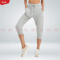 Women's Sweatpants Capri Length Drawstring Waist with Side Pockets Cropped Jogger Running Pant.