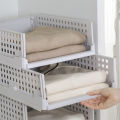 Wardrobe storage rack can be folded, disassembled, stacked, organized, storage box, plastic thickened divider, drawer-type sliding frame. 