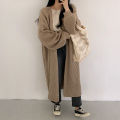 Korean version lazy wind pit strip long sweater women's coat 2023 new solid color loose balloon sleeve knitted cardigan tide. 