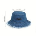 Fashionable Distressed Denim Fisherman Hat Women Washed Denim Bucket Cap with Tassel and Iron Label Outdoor Sun Protection Wide Brim.