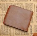 Men's Leather Wallet with Button and Accordion Design.