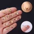 iz gothic body glyph wing zircon pendant perforated nose ring hoop woman nasal diaphragm star ten perforated nar body jewelry wholesale. 