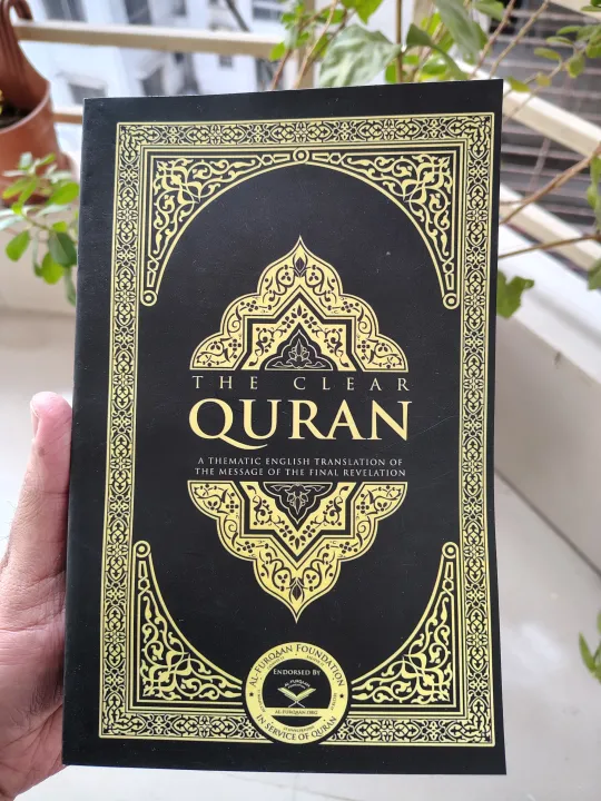 The%20Clear%20Q'uran:%20A%20Thematic%20English%20Translation%20by%20Dr.%20Mustafa%20Khattab%20-%20Premium%20Quality%20-%20Paperback%20-%20Image%202