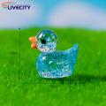 Mini Duck Statue Sparkling Duck Ornament Cute Resin Craft for Desktop Garden Dollhouse Decoration Glitter Duck Ornament.