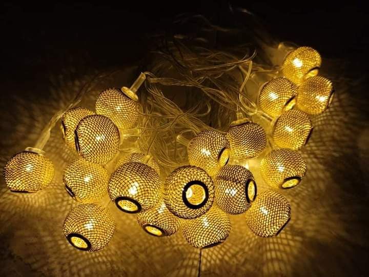 jhumka%20Hollow%20Metal%20String%20Fairy%20Light%20Balls,%20Metal%20Fairy%20Light,%20Golden%20Fairy%20Light,%20LED%20Metal%20String%20Fairy%20Mini%20Bulb-Shape%20Lantern,%20Home/Room%20&%20Wedding%20Party%20Decoration%20Light%20-%20Image%202