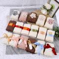 Creative tassel towel souvenirs, wedding souvenirs, baby gifts, business gifts, wedding birthdays, 100 days, full moon gifts.
