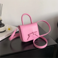 Children's Bag New Creative Bow Colored Mini Square Bag Sweet Girl Crossbody Bag Mouth Red Bag Girl side bags for girls.