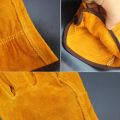 A pair / set of fire-resistant and durable leather welder gloves for welding metal hand tools, heat-resistant work safety gloves. 