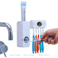RAISA Automatic Toothpaste Dispenser and Brush Holder Set Wall Mountable Bathroom Organizer with Dust Proof Toothbrush Storage.