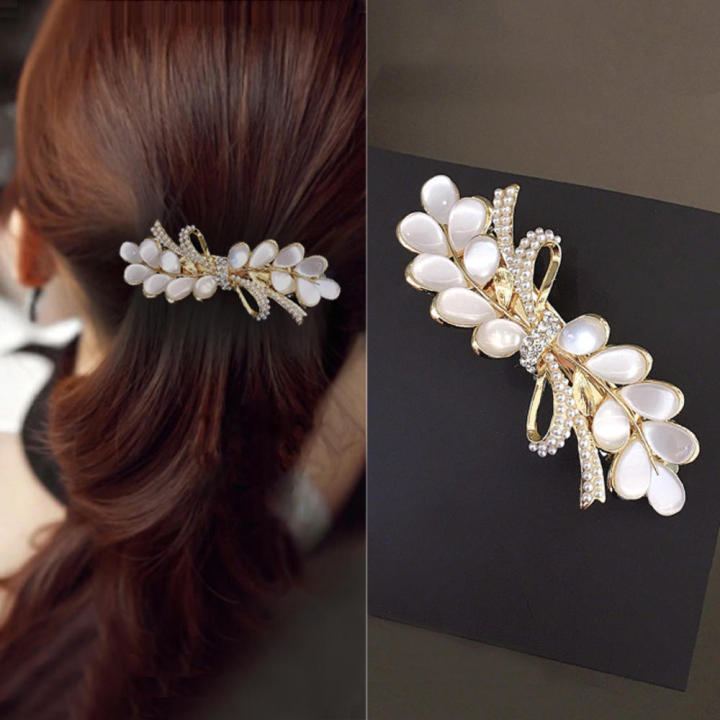 Nieuwe Koreaanse Oog Witte Kat Zirkoon Lente Haar Clip Parel Strik Boutique Legering Top Clip Elegante Vrouwen Mode haar Sieraden