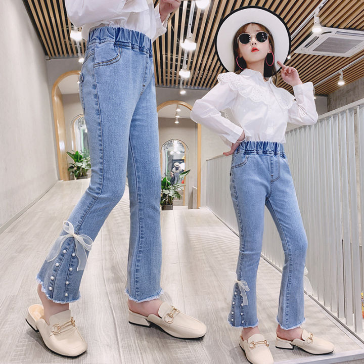 Girls stretch jeans 2021 spring new children's clothing Korean slim fit foreign bow bell pants