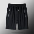 2023 Summer New Solid Color Loose Casual Thin Style Knee Length Pants Man Elastic Waist Pockets Zipper Street Motion Shorts. 