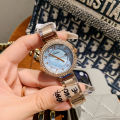 dinimi new rhinestone fashion temperament light luxury quartz watch simple commuter steel band ladies with calendar watch.