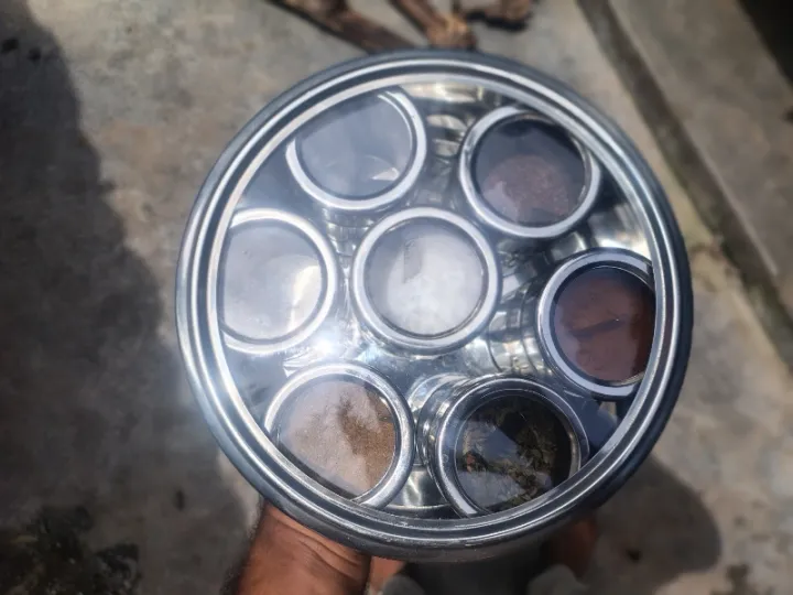 Premium%207%20Pcs%20Stainless%20Steel%20Spice%20Jar%20Set%20with%20Rotating%20Carousel%20Stand,%20Durable%20SS%20Kitchen%20Spice%20Rack%20with%20Glass%20Lids,%20Ideal%20for%20Organizing%20Spices,%20Herbs,%20and%20Seasonings%20in%20Your%20Modern%20Pantry%20System.%20-%20Image%202