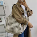 Canvas bag women's ins one-shoulder, large-capacity, lazy wind, striped fashion, big bag, casual literary hand-tote bag women.