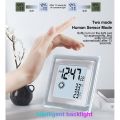 LCD Multi Function Electronic Alarm Clock Human Body ensor Weather Forecast Temperature and Humidity Clock. 
