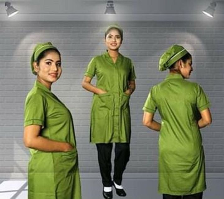 Nursing%20Dress%20with%20Name%20and%20Logo%20in%20Olive%20Color%20-%20Made%20from%20Cotton%20&%20Torey%20Fabrics,%20Accompanied%20by%20a%20Matching%20Colored%20Mask%20for%20Ultimate%20Comfort%20-%20Image%204