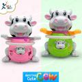 Battery operated Dancing Cute Cow Toy Swing hands & feet, Flashing light in horns  & Music. 