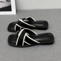 French high-end flat slippers women's summer wear 2024 new thick-soled soft-soled versatile beach sandals for women.