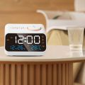 Multifunctional Alarm Clock with FM Radio Rechargeable LED Digital Clock with Temperature and Humidity Display Support Sound-Activated/Keep-on Switching, Brightness/Volume Adjustable, Snooze Function. 